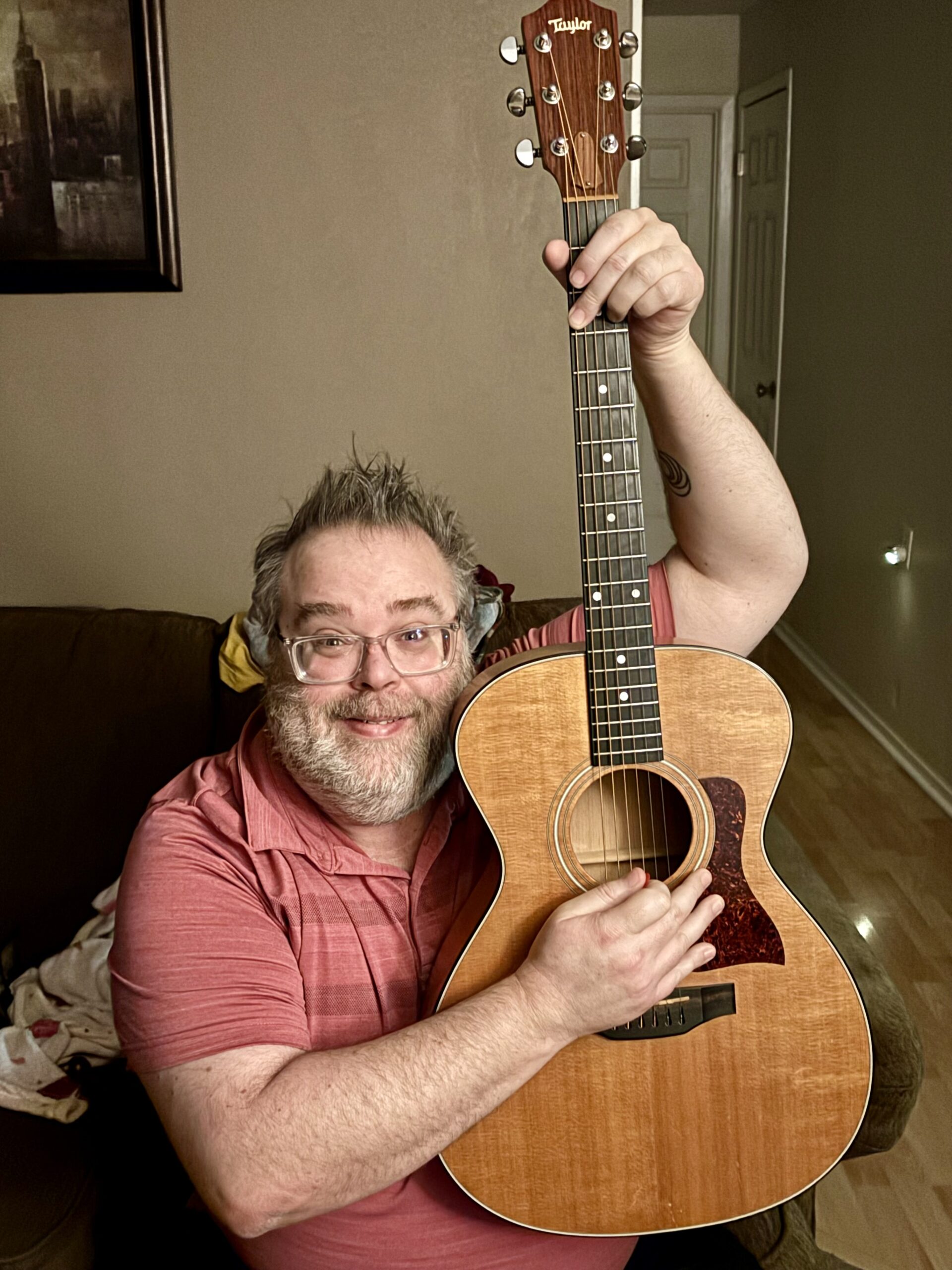 Me playing a Taylor I had just bought. 1996 and maple top. Made in California.